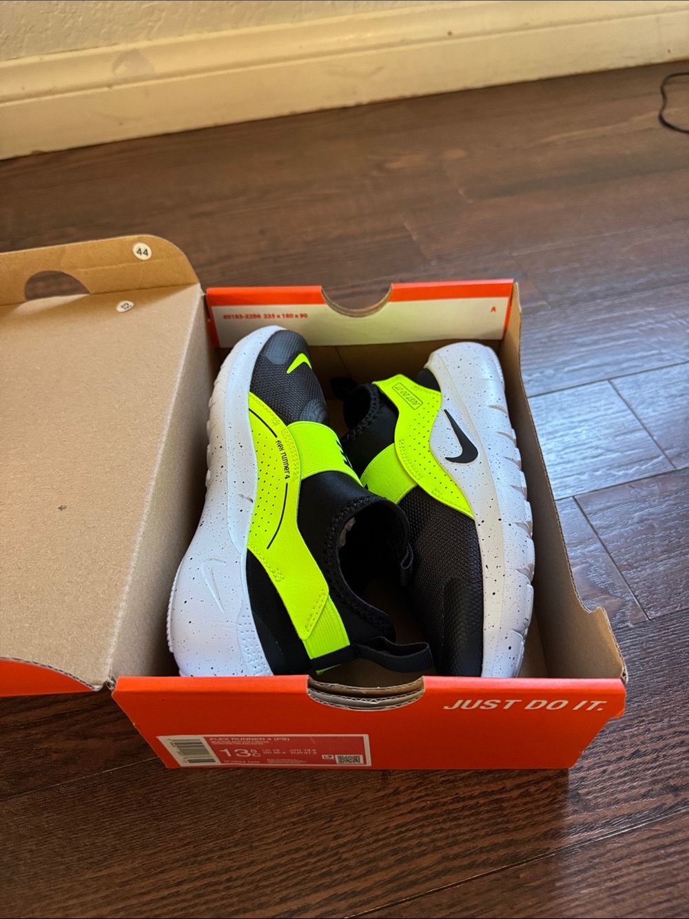 NWT- Nike Kids Black & Neon Yellow Slip-On Sneakers